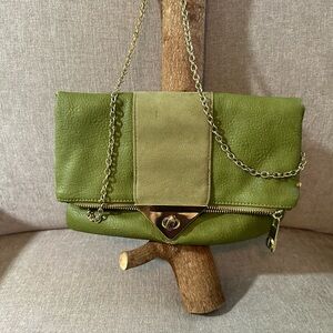 Gently used green leather & suede clutch with gold chain.